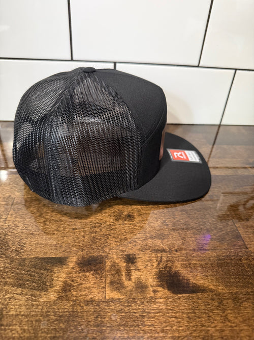 DH1 - SOLID BLACK Richardson 168 flat bill hat with brown leather patch